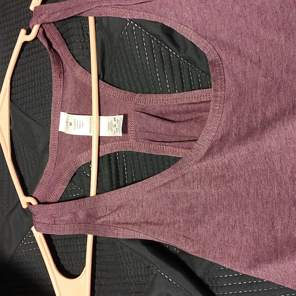 Women's size medium tank top by icy zone. Never worn. Tried once. Oversized tank